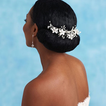Best wedding Hairstyle with Tiara fixed at the back for Black Women