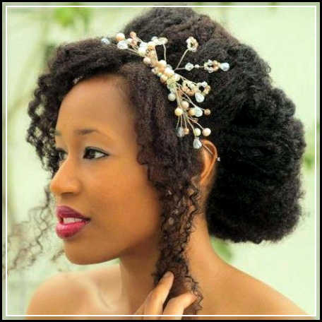 Interesting natural wedding curly hairstyle for black women