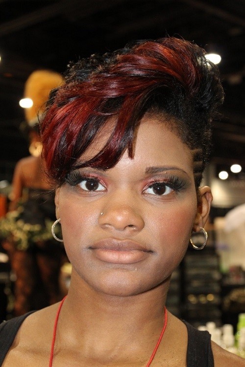 Captivating short Mohawk haircut with highlights African American at 30