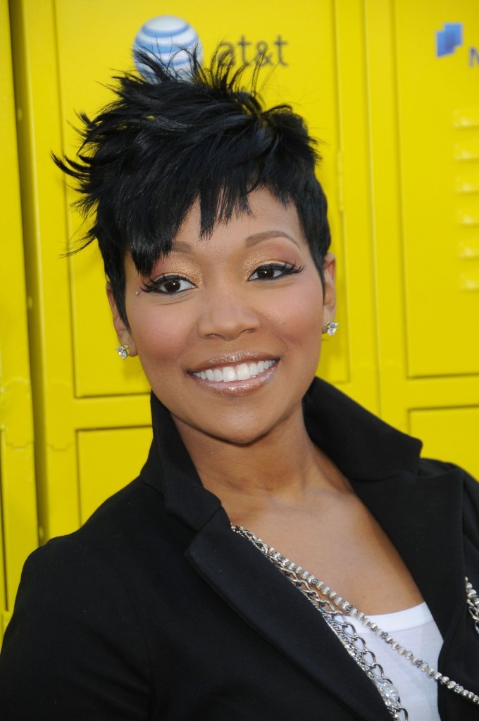 Eye catching short messy haircut with up do African American