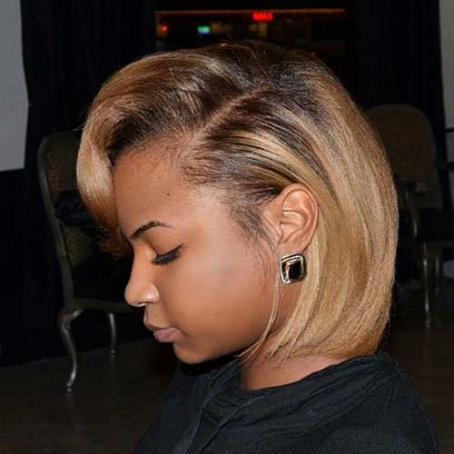 Short haircut with brown highlights layered African American